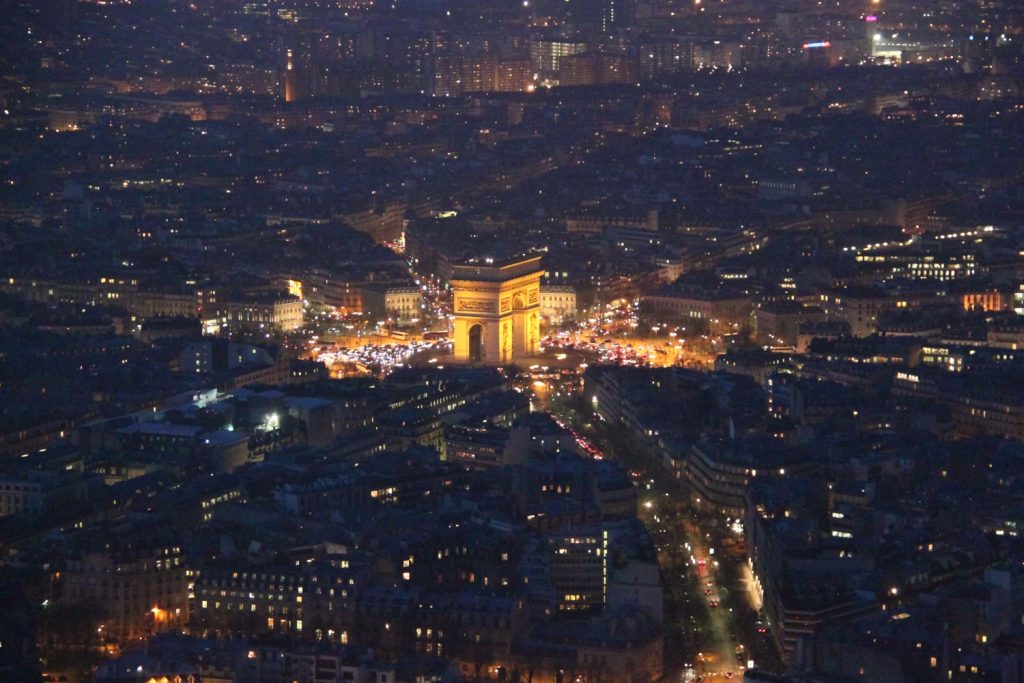 L'Arc de Triomphe by night, view form the Eiffel Tower