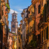 Via Mazzini in Verona, the historic street where the vision of the Statue of Peace was born, bustling with shops and cultural heritage, reflecting the city’s role as a birthplace of hope, unity, and artistic expression