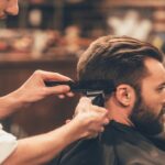 Man getting a haircut at a gents barbershop