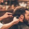 Man getting a haircut at a gents barbershop