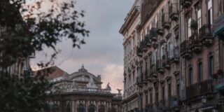 Crowds gathering at outdoor bars at Piazza Bellini, Naples, at night